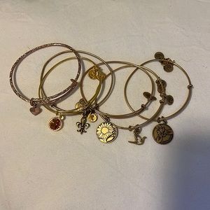 Alex and Ani bundle gold bangles